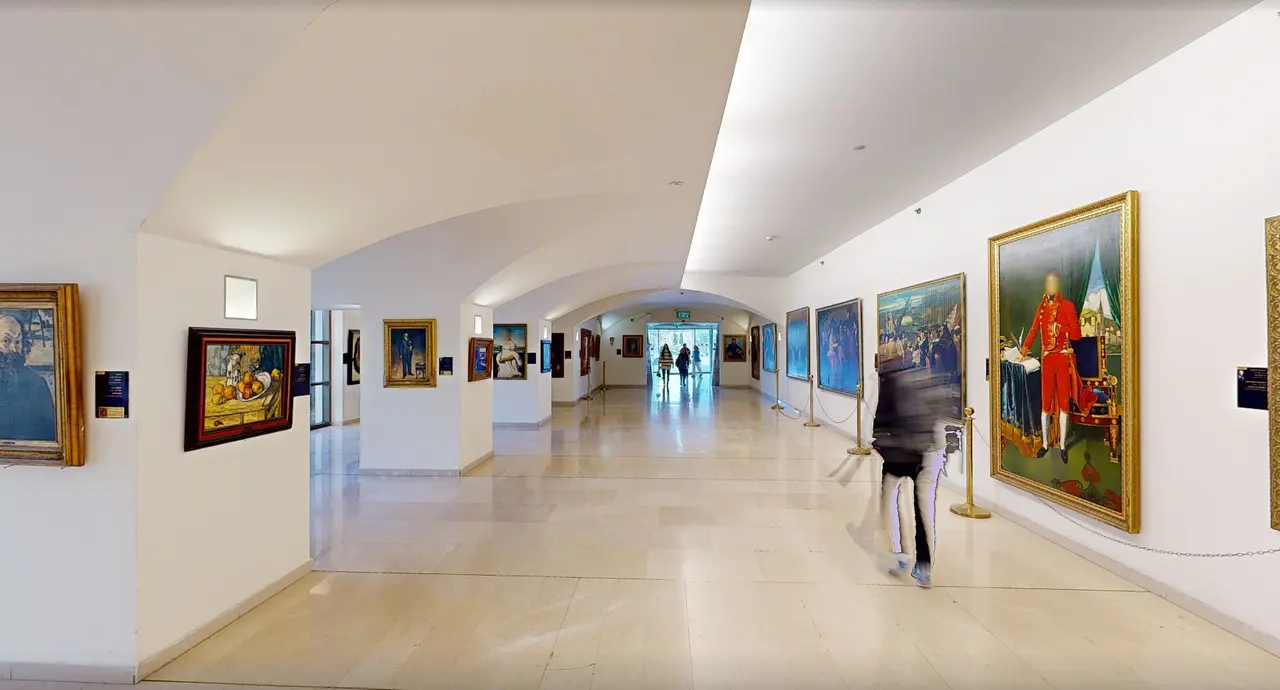 The gallery corridor at Beilinson, paintings along the walls, in the digital twin